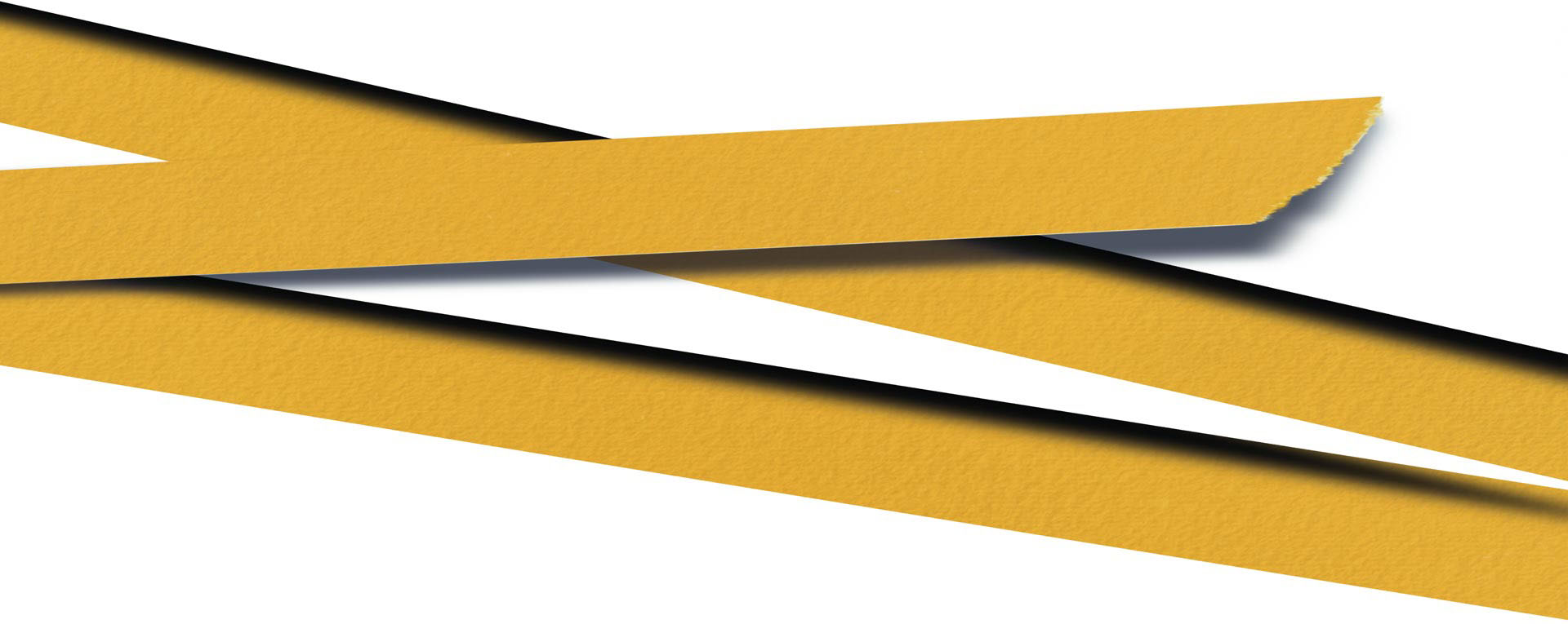 Layers of paper overlapping yellow strips that look like police tape.