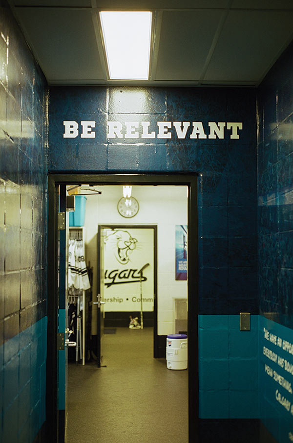 A photo of some hallways in the Cougars back offices. Above a door it reads 'Be relevant.'