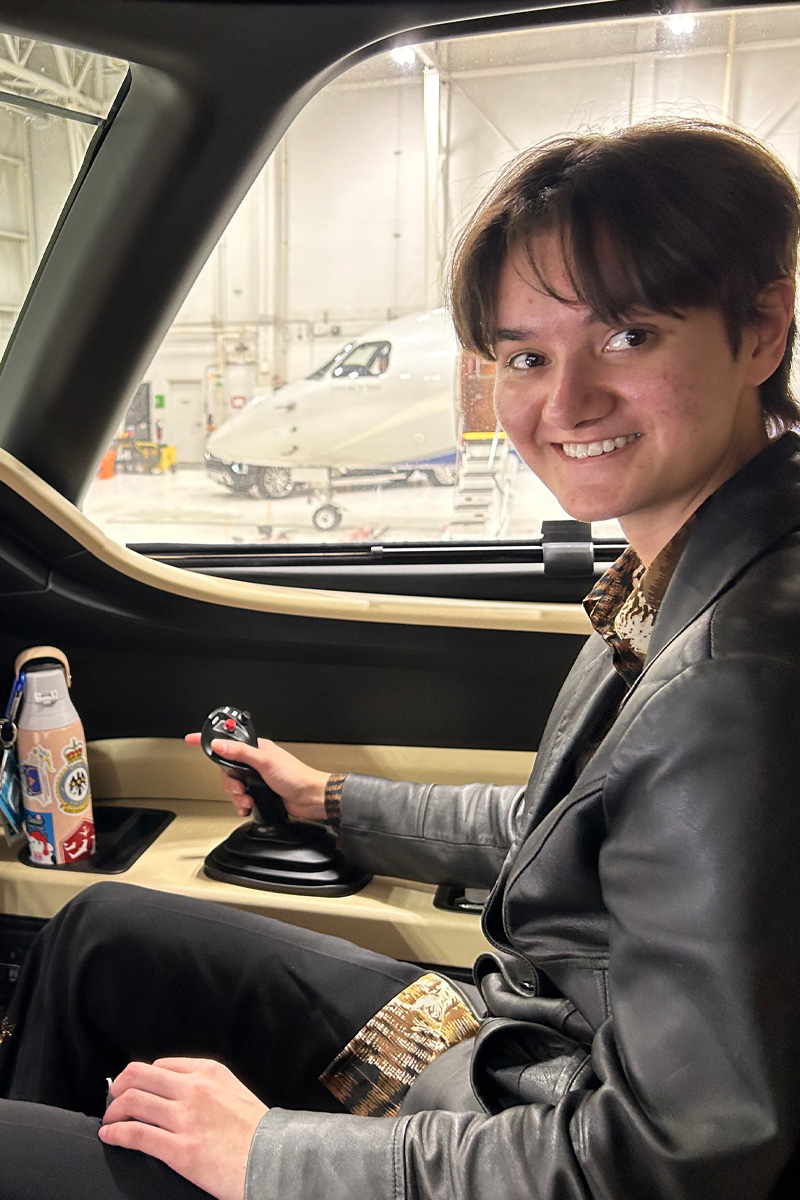 Kayla Evenson in the cockpit of an MRU plane