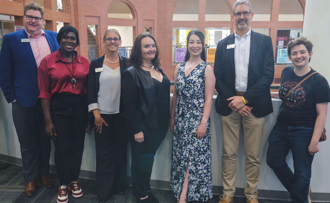 From left to right: Chris Rogerson, associate vice-president, student experience and success, Yemi Adeyemi, healthy campus team manager, Jody Arndt, director, wellness services, Sarah Karpa, peer support program coordinator, Julia Nicholls, peer support program coordinator, Ron Burke, senior development officer and Anisa Tilston, SAMRU vice-president student affairs.