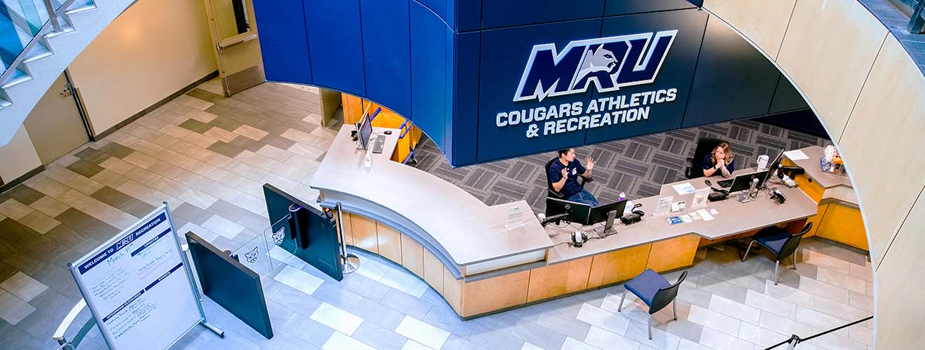 Photo of the Cougars Athletics and Recreation entrance taken from the floor above.