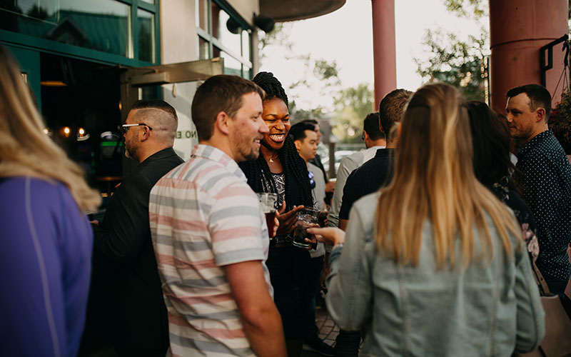 A group of people socializing at a community gathering.