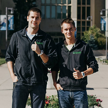 Derek Rucki and Stefan Radeta outside East Gate at Mount Royal University