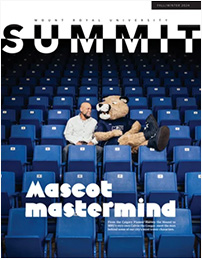 Cover of the Fall/Winter 2024 issue of Summit: Photo of alumnus Grant Kelba and Calvin the Cougar sitting in bleachers looking at one another.