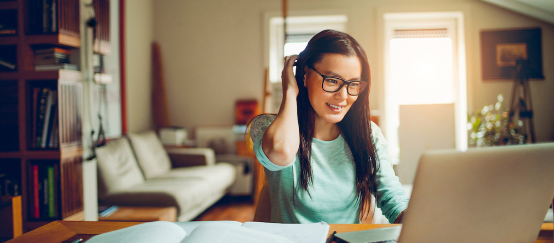 A woman working from her home office.